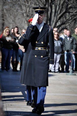 At the end of the wreath-laying ceremony, three Honor Guards salute as they file past the Tomb to exit.