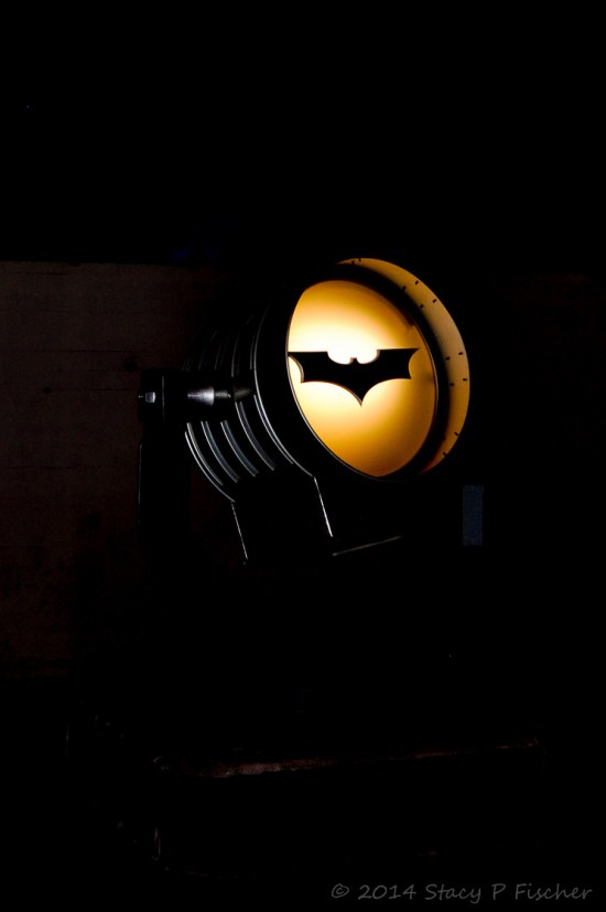 Bat-Signal; Photo: SPFischer Bathed in shadows the bat-signal glows yellow around the symbol of the bat.