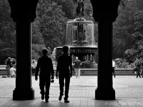 Bethesda Fountain Central Park with silhouetted visitors
