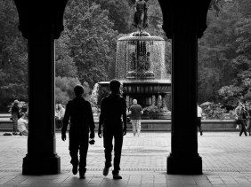 Bethesda Fountain Central Park with silhouetted visitors