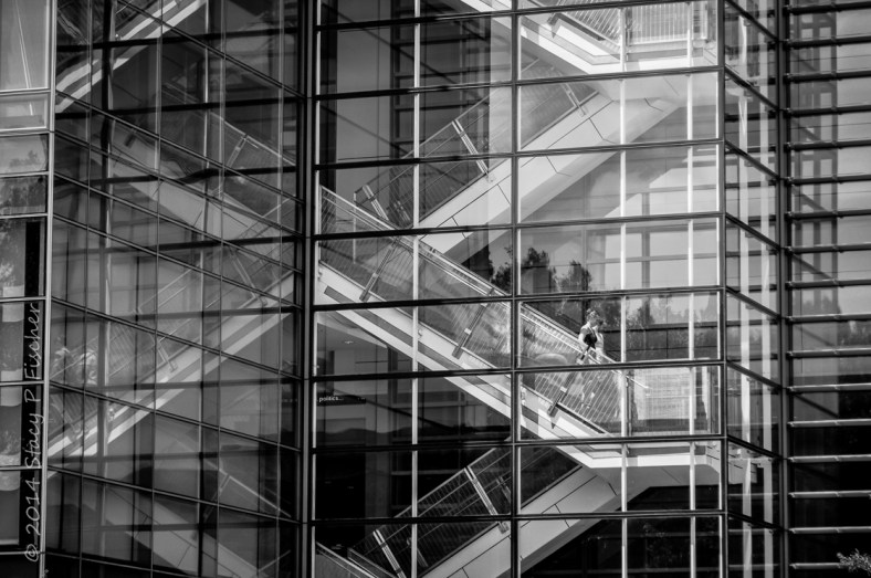 Reflections of escalators on exterior of The Newseum in Washington, DC