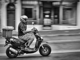 Panning motion of passing motorcyle