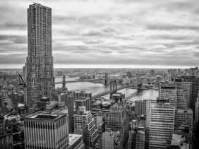 Skyline, Manhattan and Brooklyn Bridges spanning the East River connecting Lower Manhattan to Brooklyn