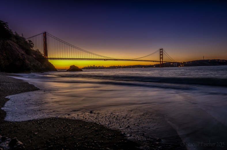 Golden Gate Bridge sunrise silhouette from Kirby Cove in Sausalito