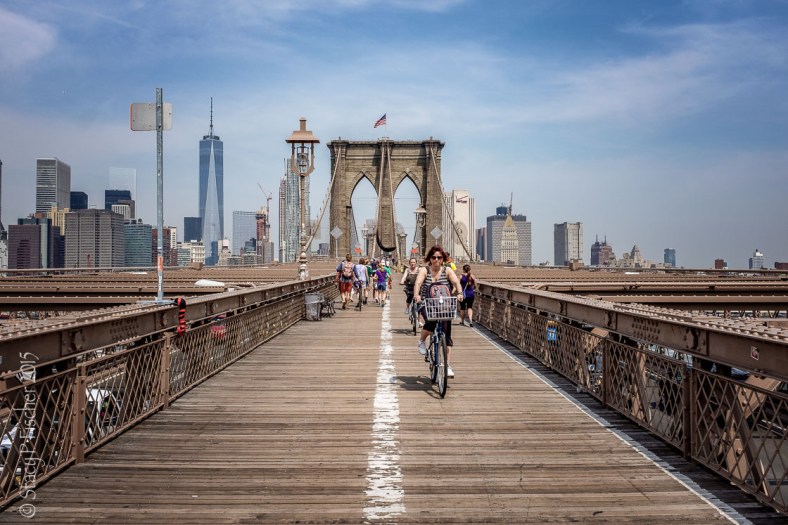 Bicyclist on Brooklyn Bridge pedestrian walkway