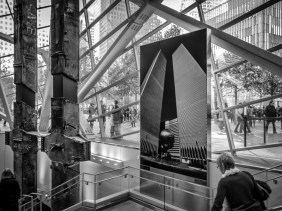 9/11 Memorial Museum entrance with photo of World Trade Center Towers and tridents
