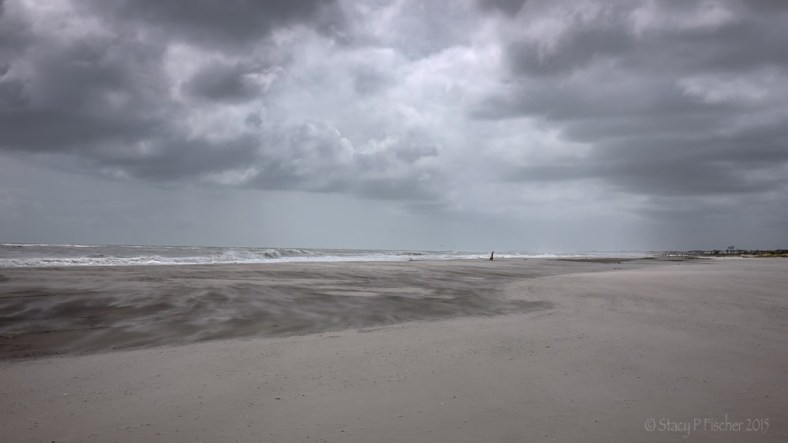 Lone figure on overcast 21st Street Beach, Ocean City, New Jersey