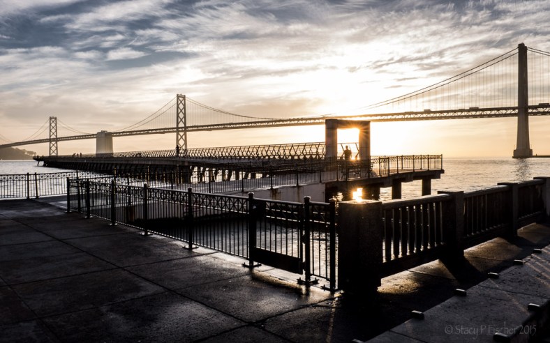 San Francisco Embarcadero Pier 14 sunrise with Oakland Bay Bridge