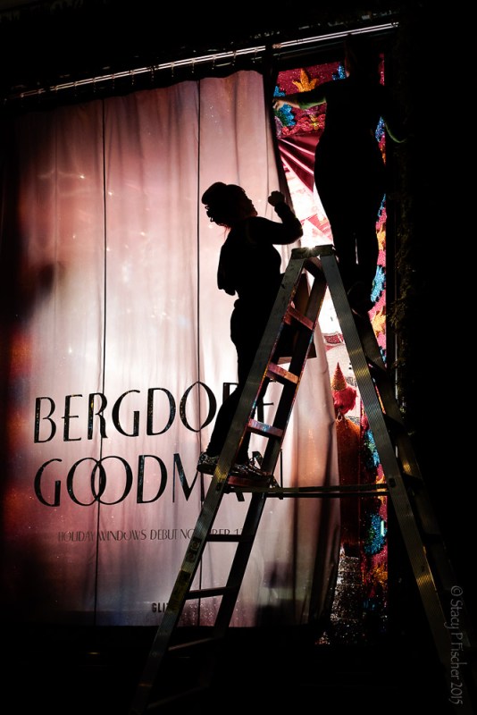 Employees work on unveiling Bergdorf Goodman's 2015 Christmas windows