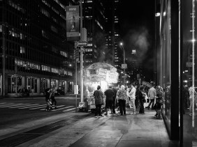 Late night New York City food cart customers