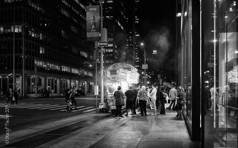 Late night New York City food cart customers