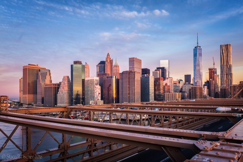Lower Manhattan sunrise viewed from the Brooklyn Bridge